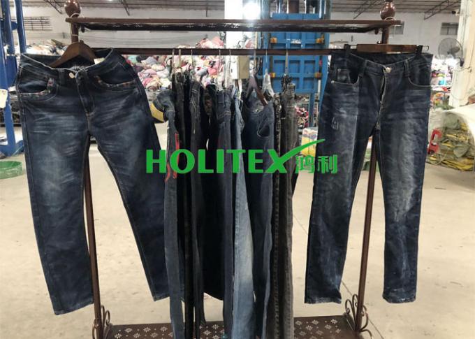 Os homens de Holitex usaram calças usadas material das calças de brim do algodão do estilo dos EUA da roupa